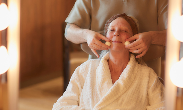 A lady enjoying a facial treatment