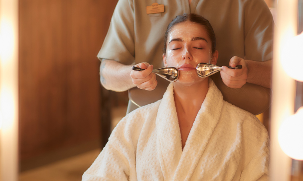 Woman having a relaxing facial massage.