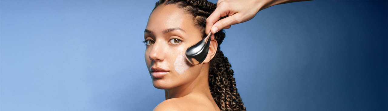 Woman having a [ comfort zone ] facial.