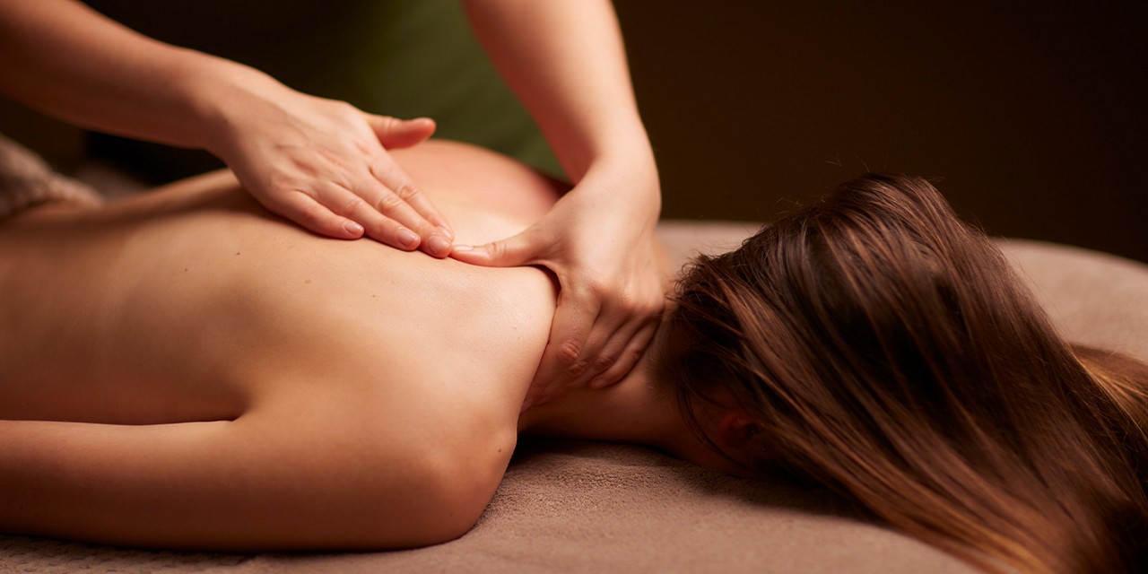 Woman having a face and body treatment. 