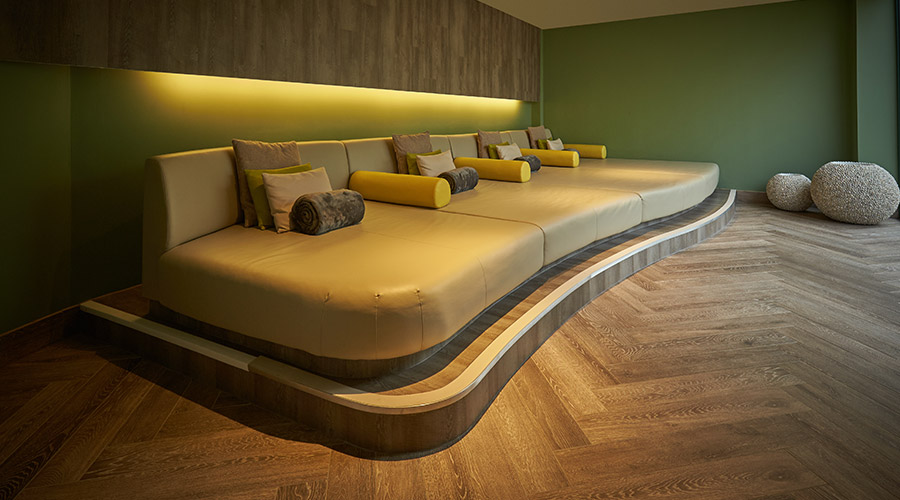 green relax area with large sofa 