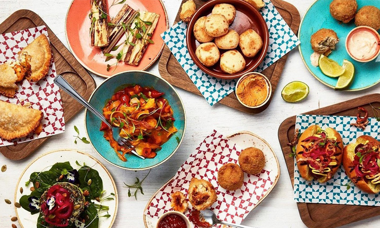 selection of dishes including empanadas 