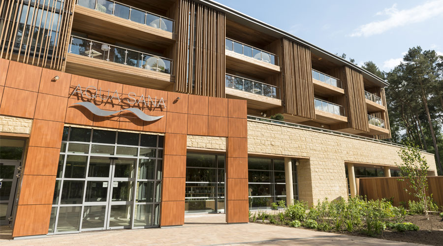 Woburn Forest Aqua Sana Entrance from the outside, brick wall and Aqua Sana sign