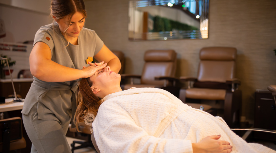 Pregnant lady having a facial.