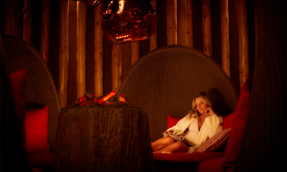 women in fireside relax