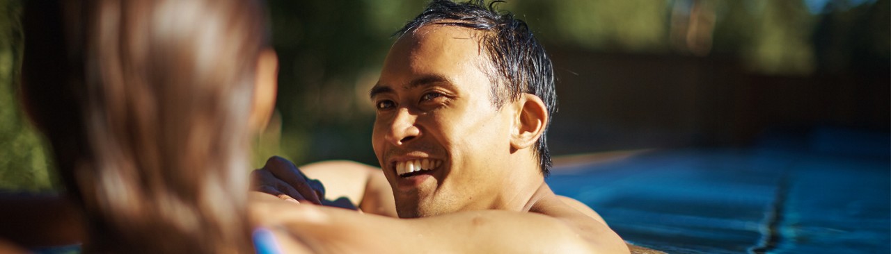 man and women in outdoor pool