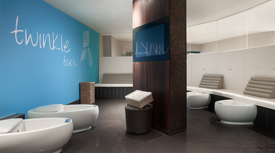 Reflexology footbaths with comfortable bench seating.