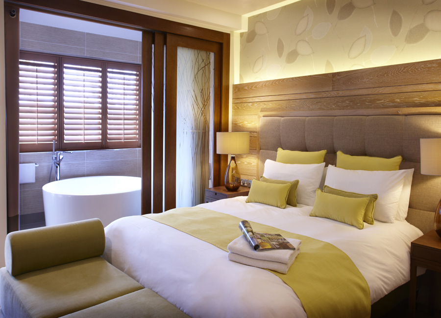 double bed with bath next to bed