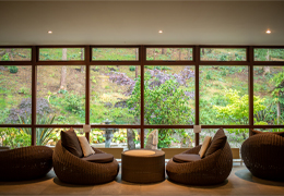 Comfortable lounging chairs looking out to a Zen Garden