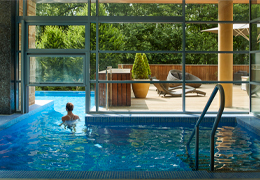 Woman swimming in an outdoor pool
